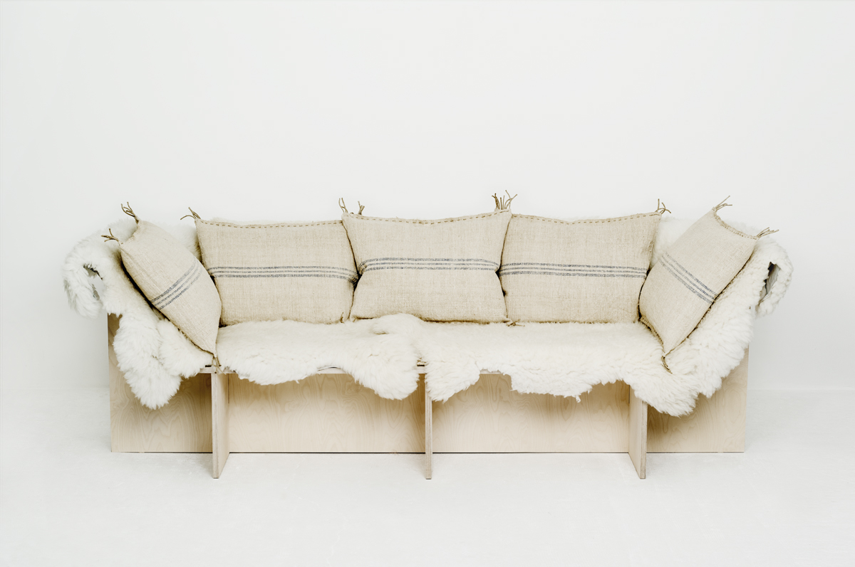 Sofa from les Foins Blue with sheepskins